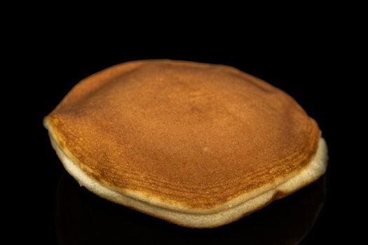 The Dorayaki , Japanese traditional red-bean pancake dessert isolate on black background