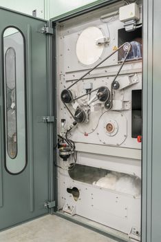 the mechanism of the chain and the gears and equipment in the textile workshop. closeup