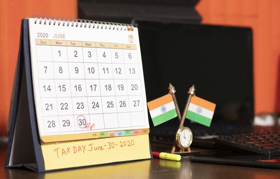 Tax day or deadlines for filing income tax return in india on june 30 marked as reminder in calendar.