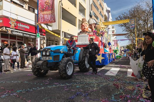 Loule, Portugal - February 25, 2020: BREXIT float parading in the street in front of the public in the parade of the traditional carnival of Loule city on a February day