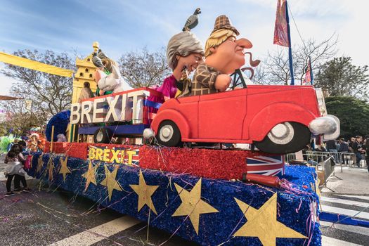 Loule, Portugal - February 25, 2020: BREXIT float parading in the street in front of the public in the parade of the traditional carnival of Loule city on a February day