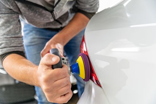 repair and polishing of rear headlights and the body of luxury cars.