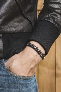 closeup leather bracelet on man's wrist