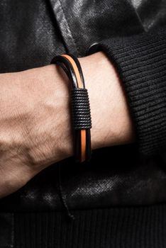 closeup leather bracelet on man's wrist