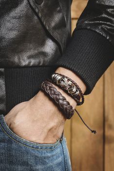 closeup leather bracelet on man's wrist