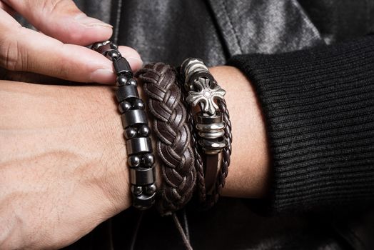 closeup leather bracelet on man's wrist