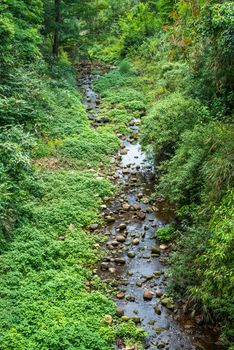 Stream river in the mountain aerial view in Jiezi, Sichuan province, China