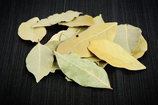 Closeup dried bay leaves, ingredient for cooking, Herb concept.