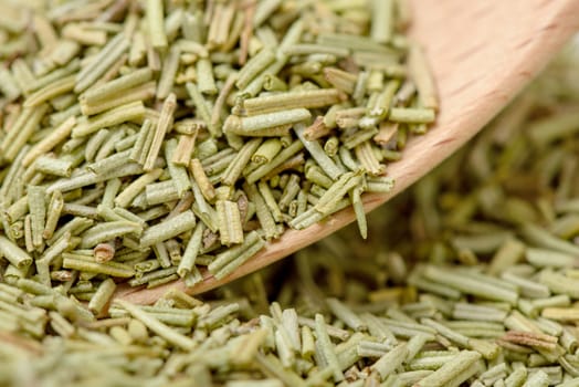 Closeup organic dried rosemary, ingredient for cooking. Herb concept.