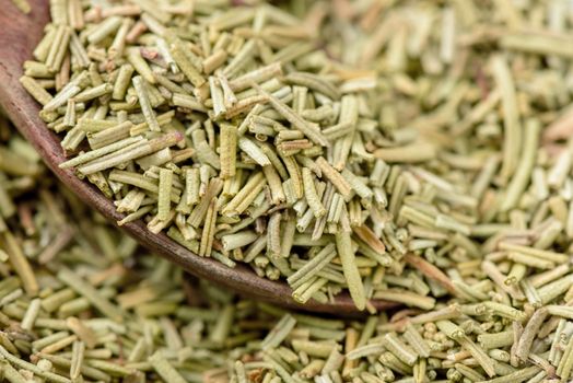 Closeup organic dried rosemary, ingredient for cooking. Herb concept.