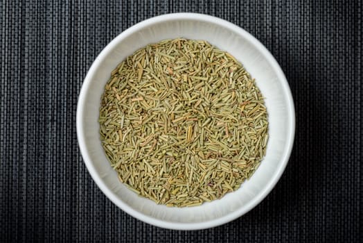Closeup organic dried rosemary, ingredient for cooking. Herb concept.