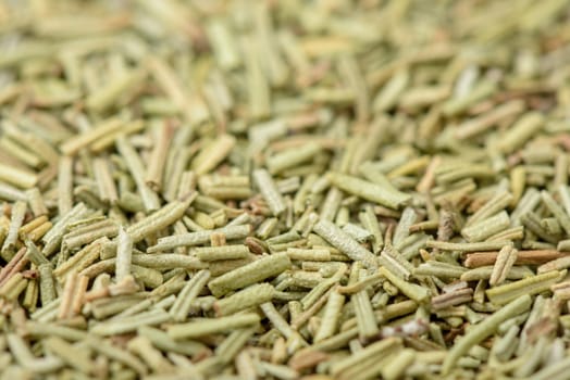 Closeup organic dried rosemary, ingredient for cooking. Herb concept.