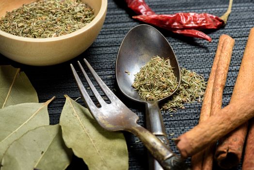 closeup dried thyme in the kitchen. herbs for cooking.