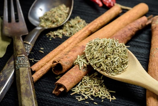 closeup dried rosemary in the kitchen. herbs for cooking.