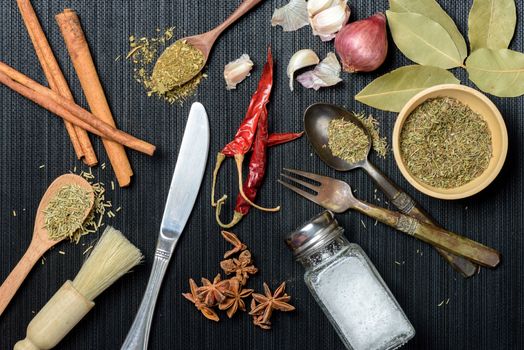 many herbs in the kitchen. herbs for cooking.