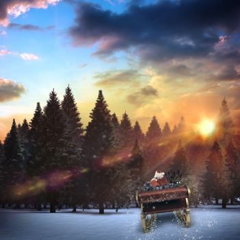 Santa flying his sleigh against fir tree forest in snowy landscape