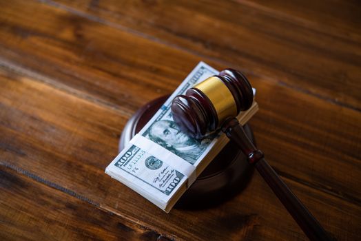 Law theme, mallet of the judge, law enforcement officers, evidence-based cases, and documents taken into account.