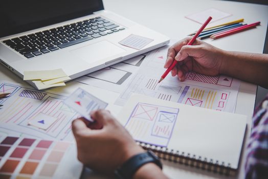 designer graphic creative ,creativity woman  working on laptop and designing  coloring color ideas style