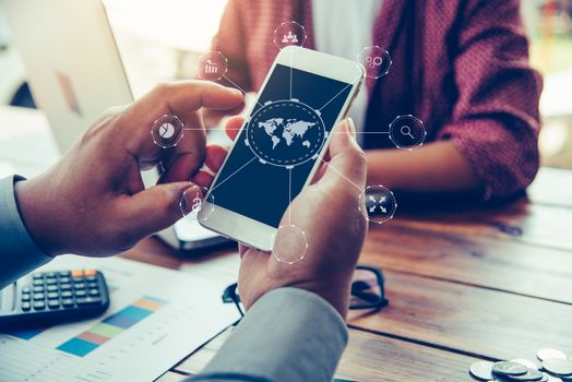 hands business holding blank screen mobile in desk work.