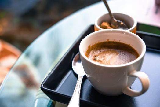 Coffee mug placed on the desk.  drink in coffee shop