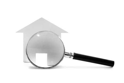 real estate searching(magnifying glass with house symbol on white)