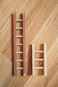 short and long wooden ladder