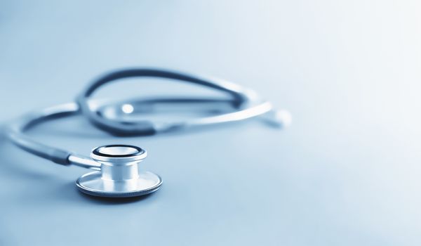 stethoscope blue tone background with copyspace