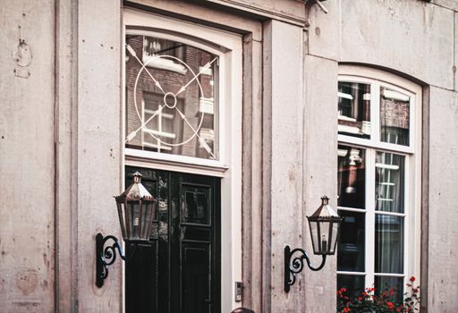 Architectural detail of a building on the main city center street of Amsterdam in Netherlands, european architecture