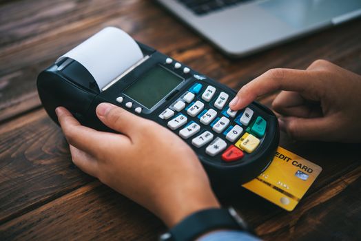 Paying by credit card , buying and selling products using a credit card swipe machine