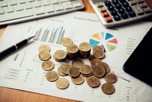 Coins stacked on graph paper. Business Concept of business