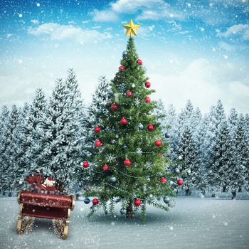 Santa flying his sleigh against christmas tree in snowy landscape