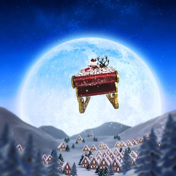 Santa flying his sleigh against christmas village under full moon