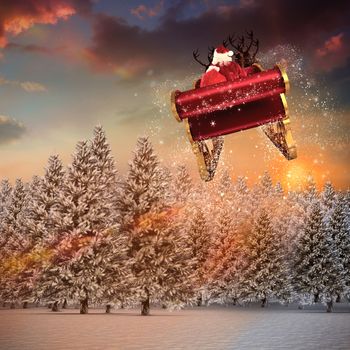 Santa flying his sleigh against fir tree forest in snowy landscape