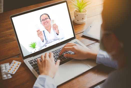 The patient's viewpoint consult with the doctor via social media such as laptop, smartphone, almost. The work for home concept of doctors and patients.