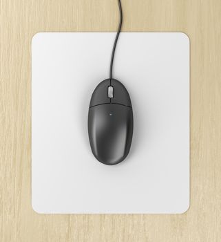 Black computer mouse on a mouse pad, top view
