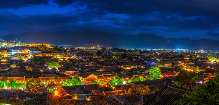 Panorama Top view scene of ancient LiJiang old town at twilight time, is the historical center of Lijiang City, in Yunnan, China.It is a UNESCO World,culture and traditional,travel and tourist concept