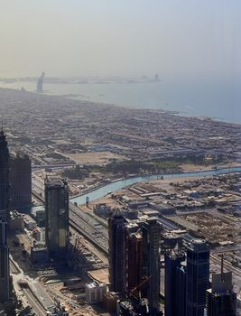 Aerial view over the city center of dubai on a sunny day.