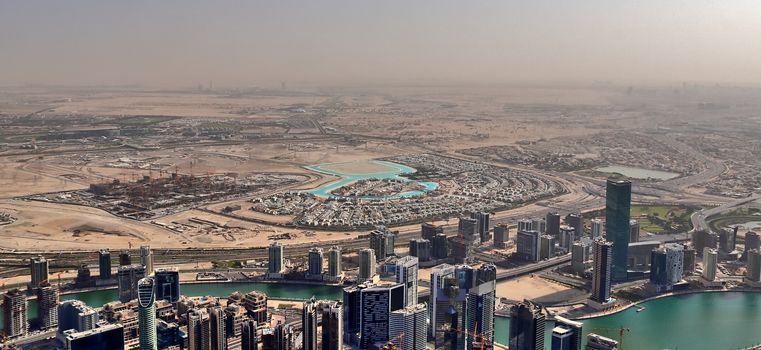 Aerial view over the city center of dubai on a sunny day.