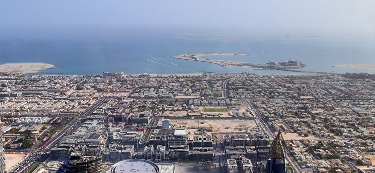 Aerial view over the city center of dubai on a sunny day.