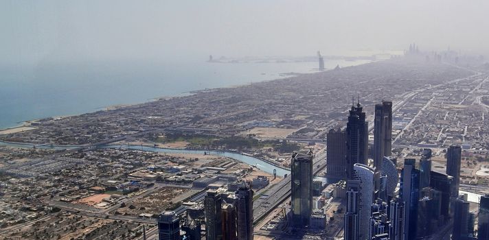 Aerial view over the city center of dubai on a sunny day.