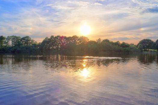 Beautiful landscape at a lake with a reflective water surface.