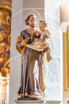 An image of a Saint with baby Jesus in his hands