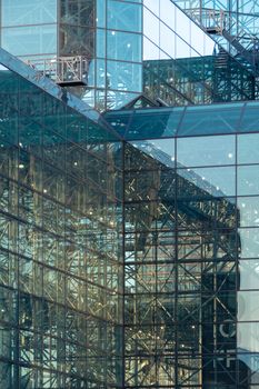 An image of a modern glass building construction in New York City USA