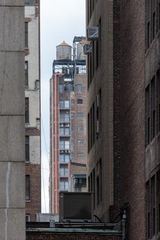 A typical water tank on the roof of a building in New York City