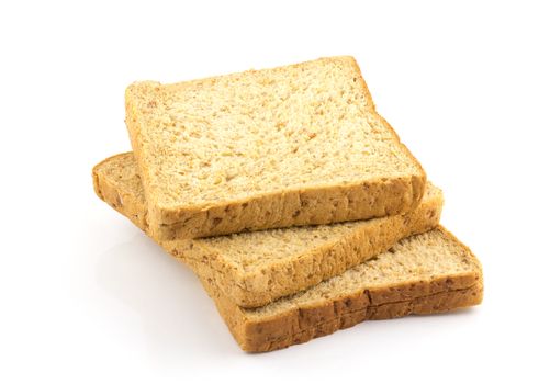 Sliced fresh whole wheat bread on white background