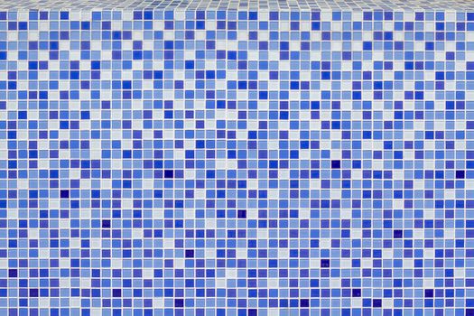 Blue ceramic tile mosaic in swimming pool