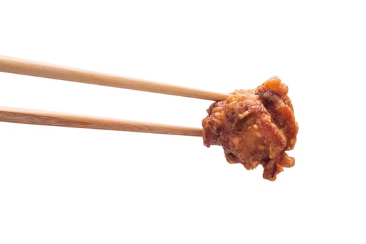 Isolate fried chicken meat, Japanese karaage and chopsticks on white background