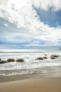 An image of the boulders at the beach of Moeraki New Zealand