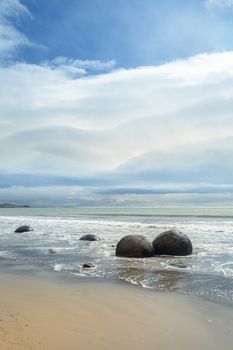 An image of the boulders at the beach of Moeraki New Zealand