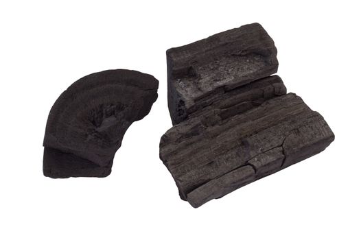 Picture of raw black charcoal on white background 